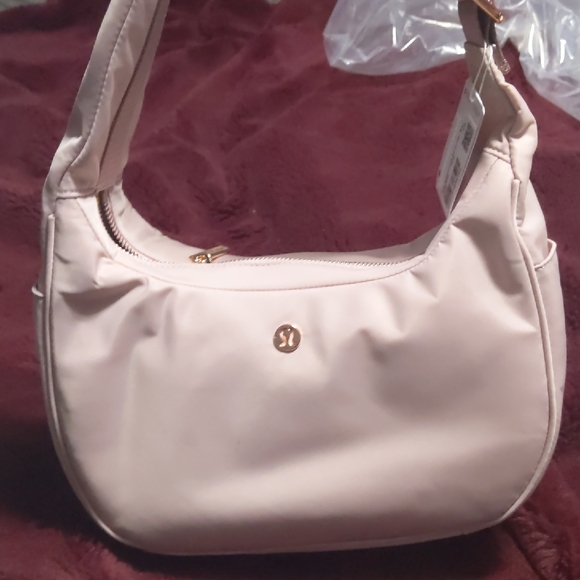 lululemon athletica Handbags - Lululemon Athletica Soft Pink Shoulder Bag